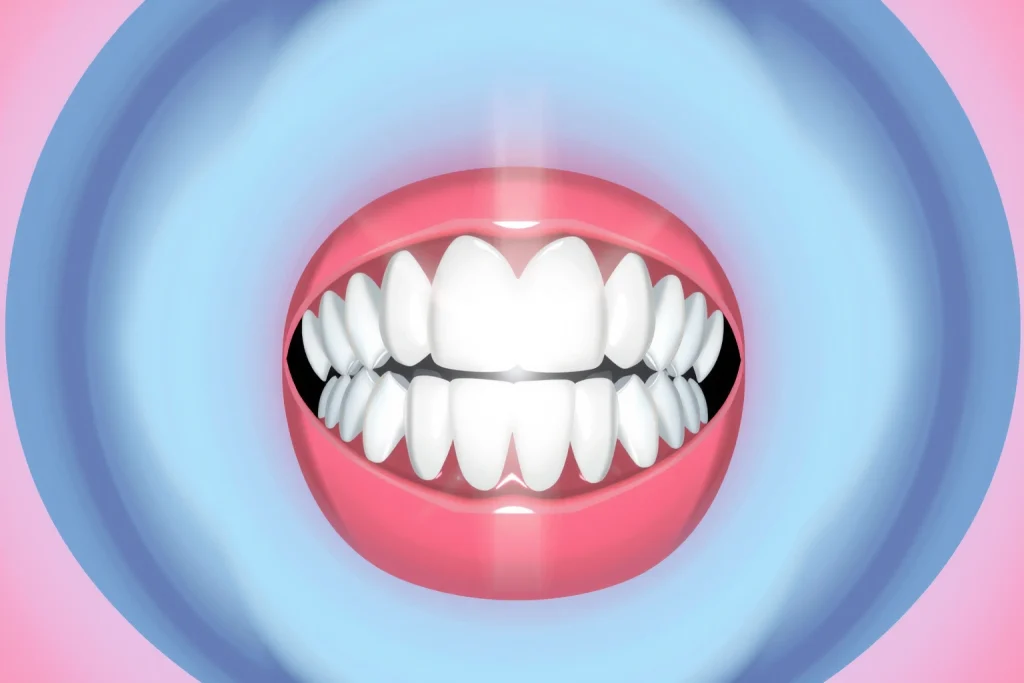 A close-up illustration of healthy pink gums surrounding clean white teeth, with a soft glowing halo effect to emphasize oral health, no visible dental tools or medical equipment, set against a clean light blue background
